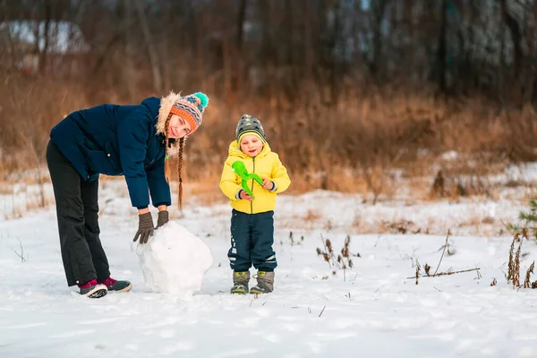 Happy Kids Making Big Snowball Make Snowman Outdoor Winter Winter — Stock Photo, Image