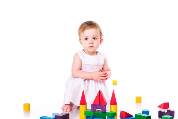 Beautiful baby building with cubes Stock Picture