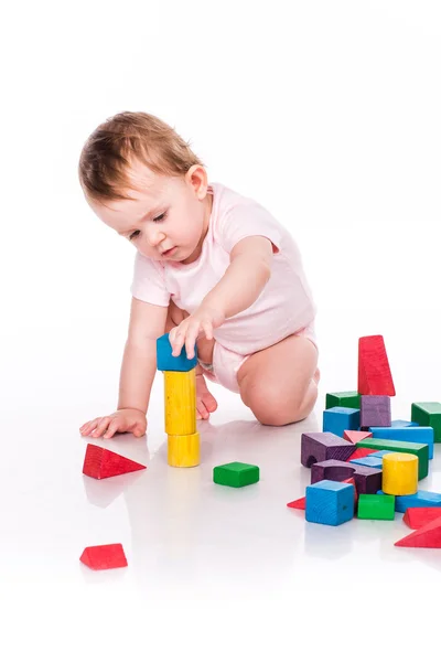 Beautiful baby building with cubes — Stock Photo, Image