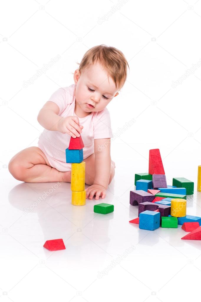 Beautiful baby building with cubes