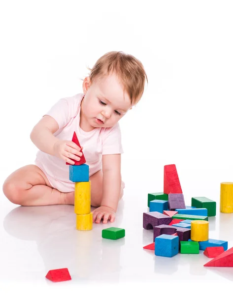 Beautiful baby building with cubes Stock Picture