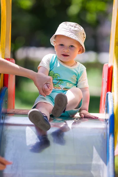 Menino no parque infantil — Fotografia de Stock