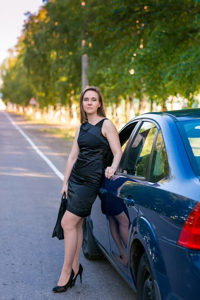 Beautiful business woman near her car — Stock Photo, Image
