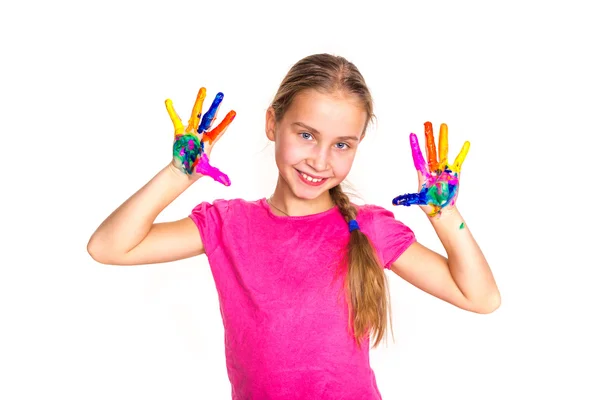 Glückliches kleines Mädchen mit ihren Händen in Farbe — Stockfoto