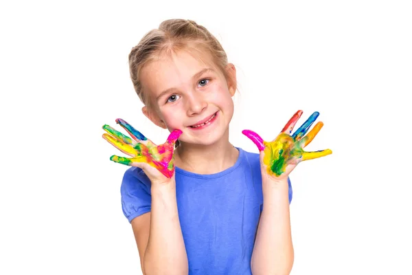 Gelukkig klein meisje met haar handen in verf — Stockfoto