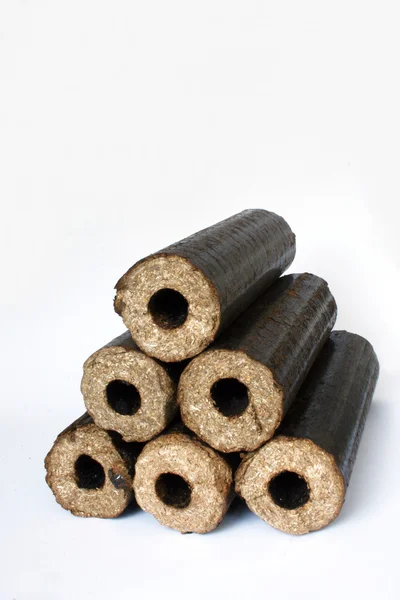 Biomass compressed briquettes — Stock Photo, Image