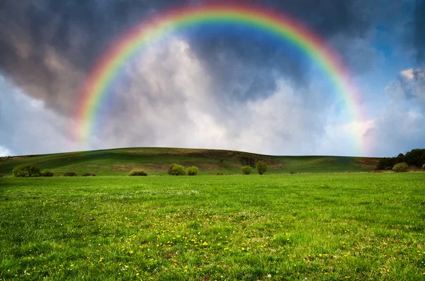 Rainbow and cloudy sky