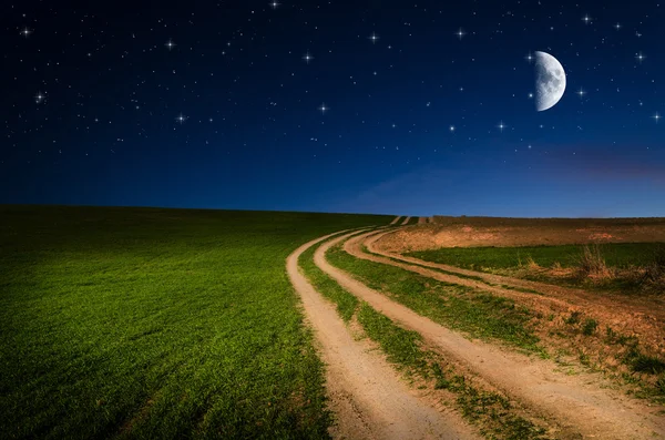 Rural road and sky with stars in the night — Stock Photo, Image