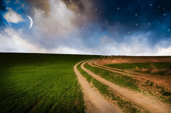 Rural road and sky with stars in the night — Stock Photo, Image