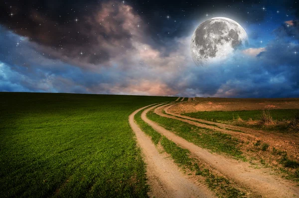 Rural road and sky with stars in the night — Stock Photo, Image