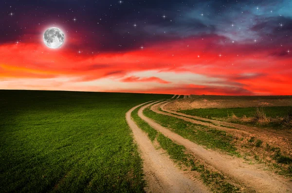 Rural road and sky with stars in the night — Stock Photo, Image