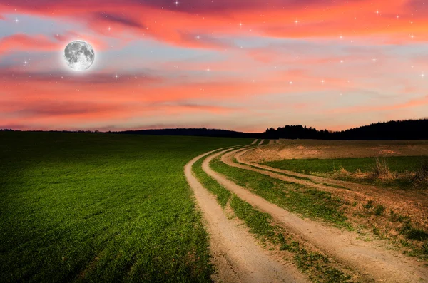 Estrada rural e céu com estrelas à noite — Fotografia de Stock