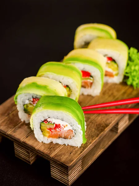 Sushi Rolls Avocado Salmon Fish Cream Philadelphia Cheese Tobiko Cucumber — ストック写真