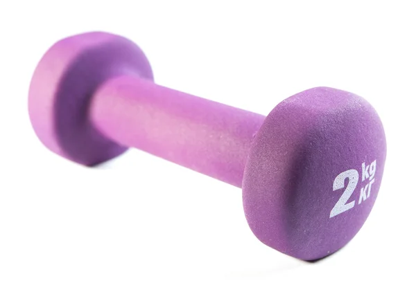 Purple dumbells on white background — Stock Photo, Image