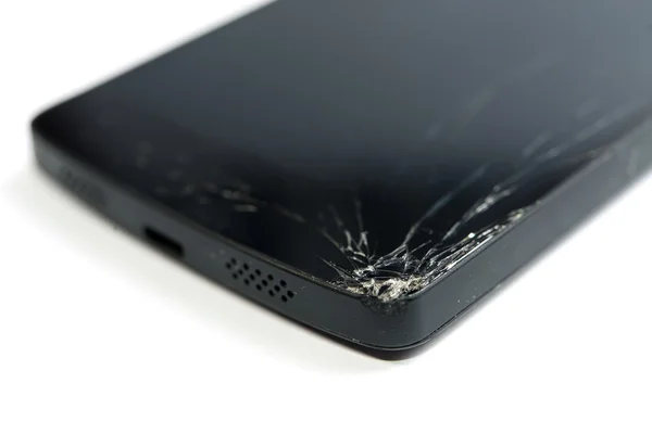 Modern telefon smartphone ile kırık ekran beyaz zemin üzerine izole.