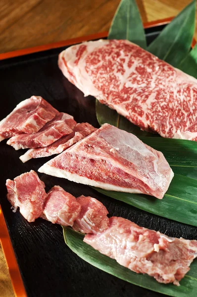 Raw fresh marbled meat Black Angus Steak. Japanese Kobe beef