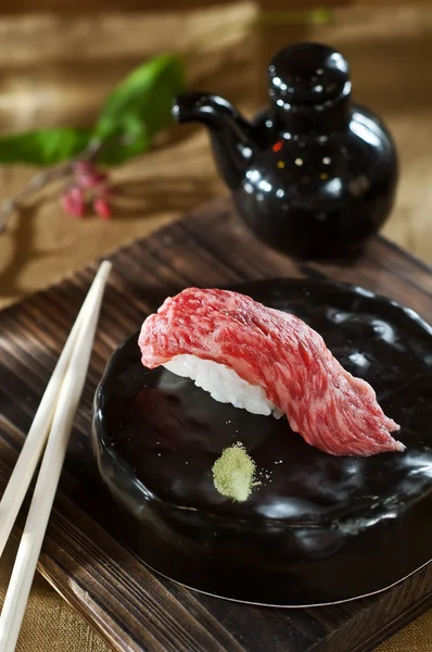 Sushi with chopsticks — Stock Photo, Image