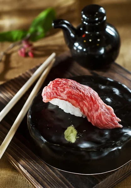 Sushi with chopsticks — Stock Photo, Image