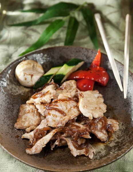 Pork fried in garlic sauce — Stock Photo, Image