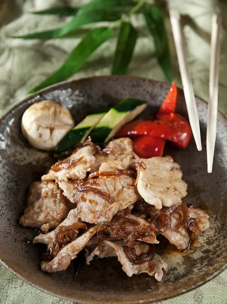 Pork fried in garlic sauce — Stock Photo, Image