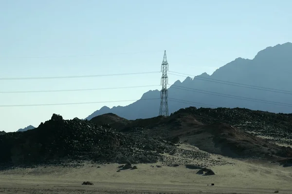 Electricity tower in desert on the Red sea governorate, Egypt. Africa