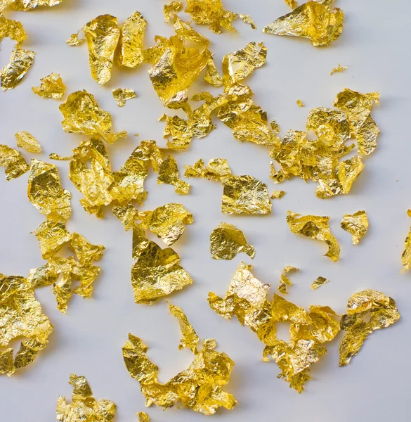 Scrapes of gold foil — Stock Photo, Image