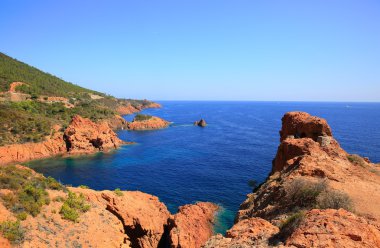 Esterel mediterranean red rocks coast, beach and sea clipart