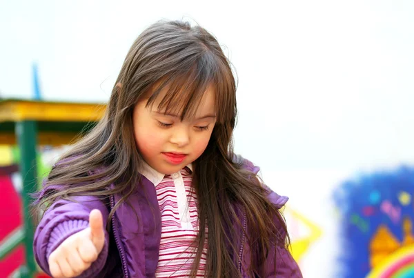 Portrait of beautiful girl on the playground — Stock Photo, Image