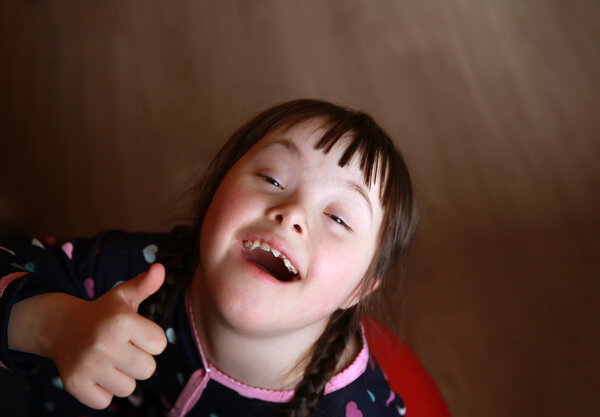 Portrait of beautiful young happy girl