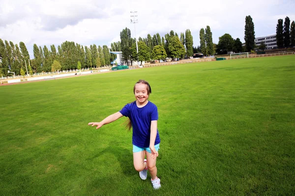 Little girl have fun on the stadium — Stock Photo, Image