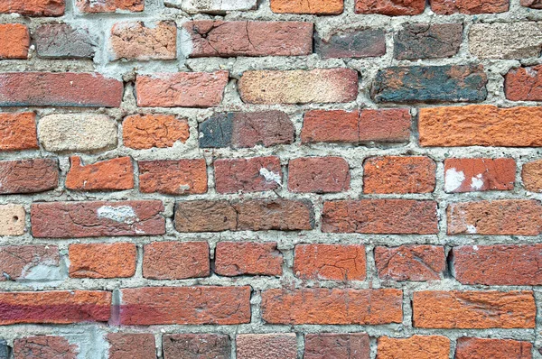 Antigua pared de ladrillo rojo envejecido para textura o fondo, ladrillo envejecido áspero clásico, mampostería vintage con mortero de cemento —  Fotos de Stock