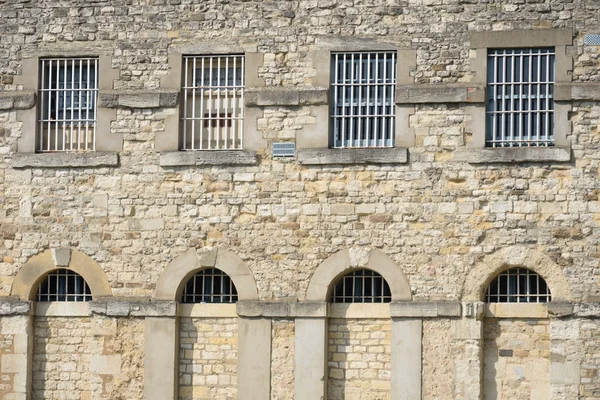 Outside of prison with bars — Stock Photo, Image