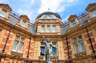 Yuri Gagarin statue waving in front of Royal Observatory greenwich london clipart