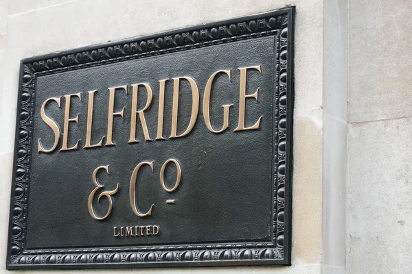 Selfridges de bronce Regístrate en piedra —  Fotos de Stock