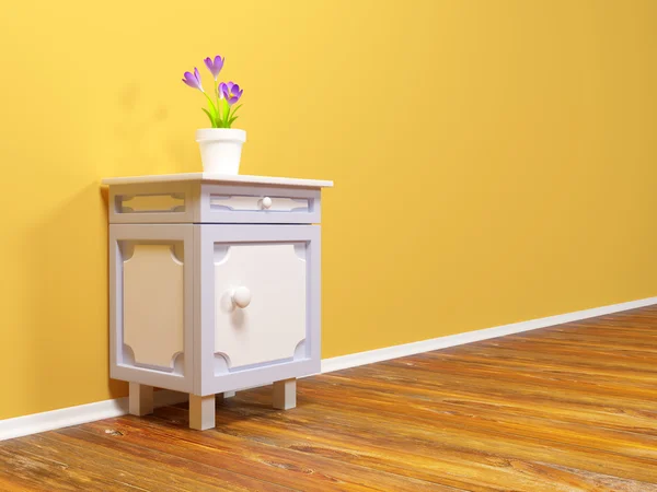 Mesa de cabeceira com flor — Fotografia de Stock
