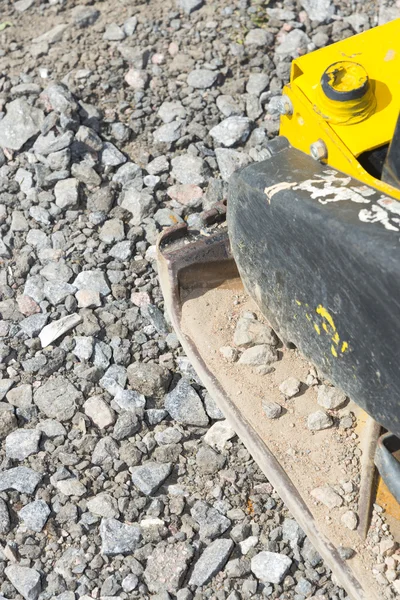 Yellow vibratory plate — Stock Photo, Image