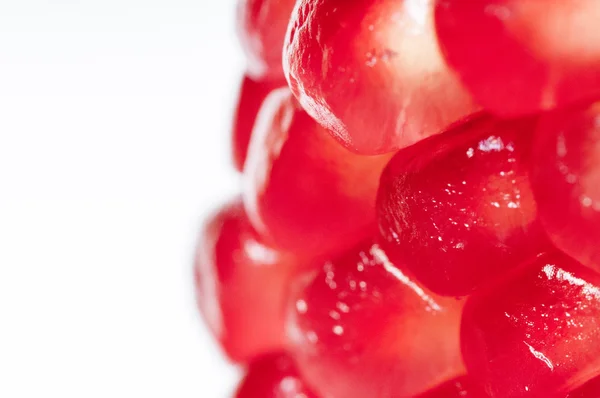 Red, ripe  seeds of the garnet. — Stock Photo, Image