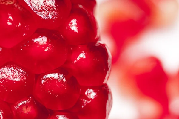 Red, ripe  seeds of the garnet. — Stock Photo, Image