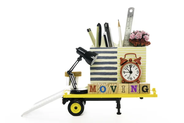 Office moving on yellow trailer — Stock Photo, Image