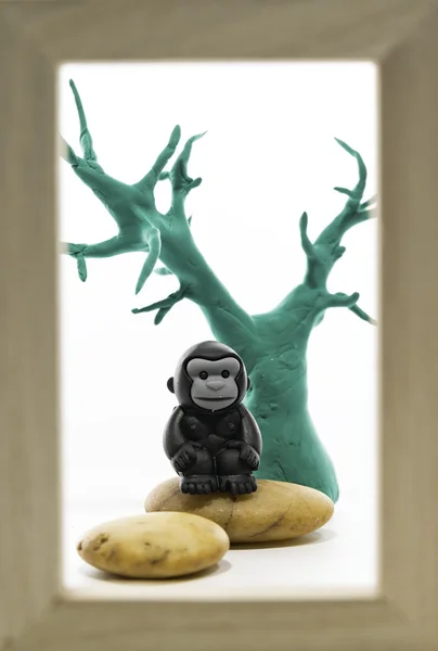 One Gorilla and green tree in the wooden frame — Stock Photo, Image