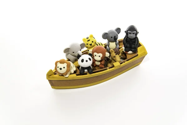 Group of animals in the small yellow boat — Stock Photo, Image