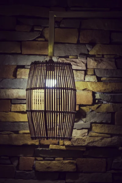 Bamboo lantern near the brick wall — Stock Photo, Image