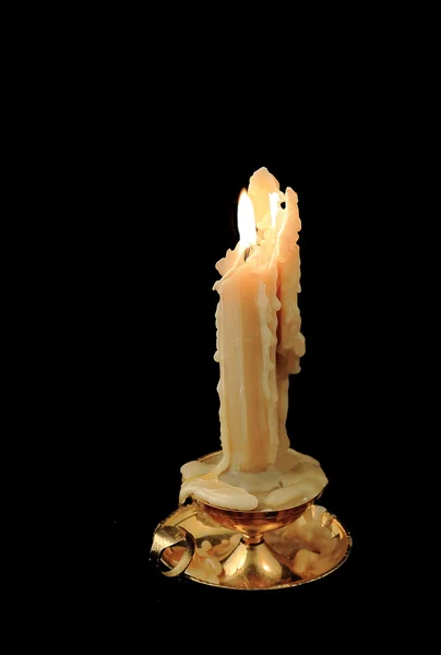 Candle in a holder — Stok fotoğraf