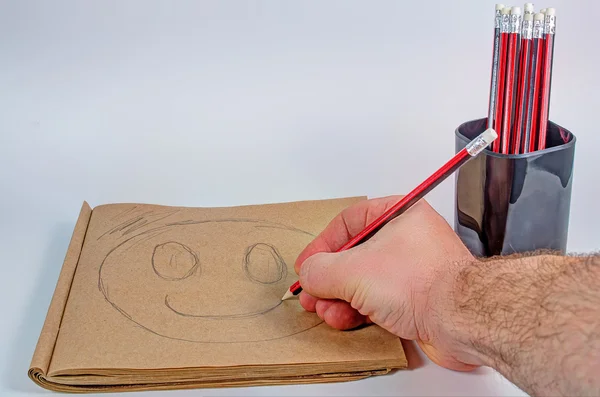 Bir kalemle kağıt üzerine çizim kalem — Stok fotoğraf