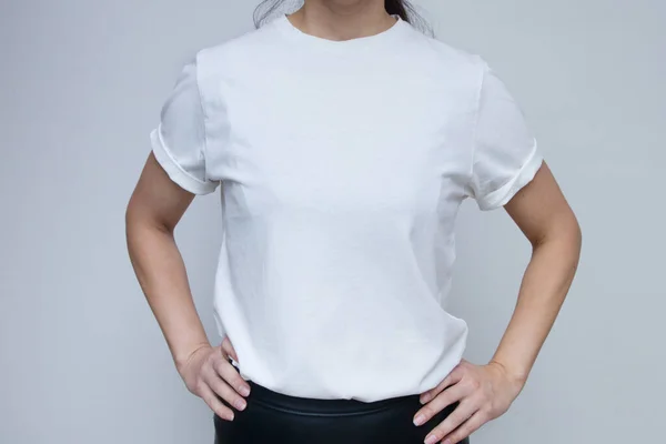 Woman in white t-shirt for mock up inscriptions