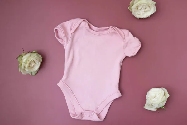 Children Clothing Top View Pink Baby Bodysuit Mock Pink Background — Foto de Stock
