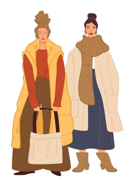 Las mujeres a la moda elegantes en el vector de ropa de invierno — Vector de stock