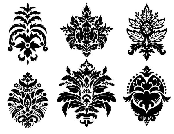 Damask ornaments, flowers and motifs silhouette — Stock Vector