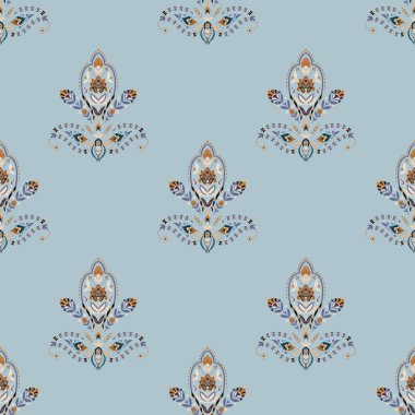 Seamless vector damask pattern with stylized floral medallions and paisley accents in soft blue tones. Elegant for wallpapers, bedding, and fabric.
