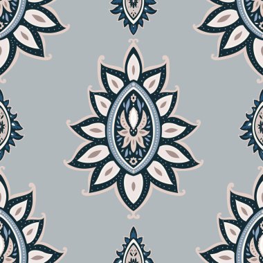 Ornamental medallion motifs in dusty blue palette, seamless vector pattern combining floral and paisley elements for textiles and wallpaper.